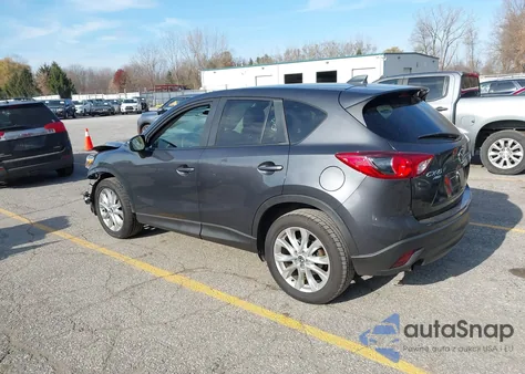 2015 Mazda Cx-5 Grand Touring z USA, uszkodzony, nr VIN JM3KE4DY8F0490897